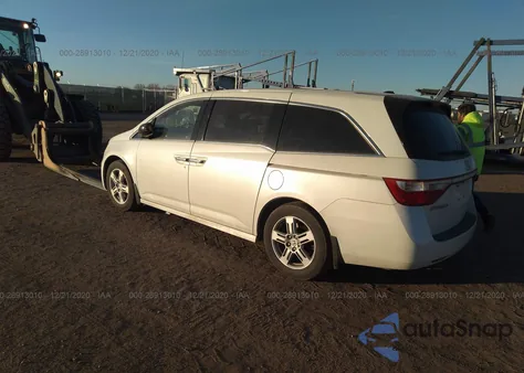 2012 Honda Odyssey Touring z USA, uszkodzony, nr VIN 5FNRL5H9XCB014055